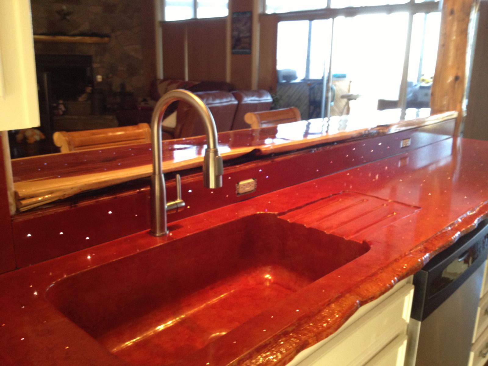 Red kitchen countertops cast in place with LED lights