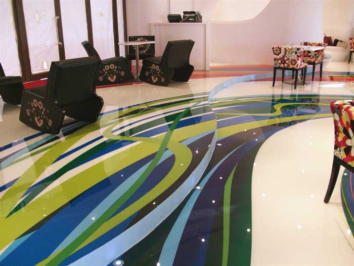 The colorful patterns on the floors of the BoHouse Café are vinyl decals augmented in some areas with Elite Crete's Reflector Enhancer.