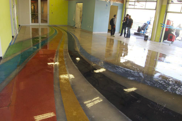 Ribbons of dyed colors were placed on this concrete floor before polishing.