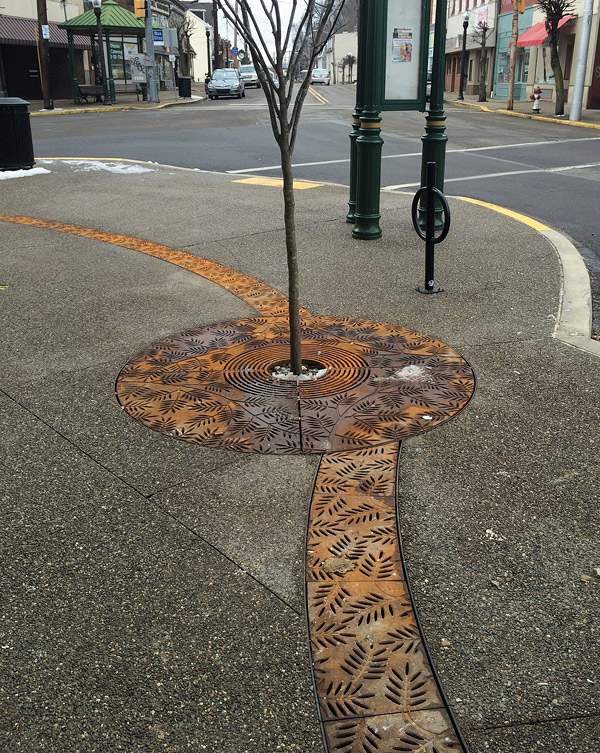 Decorative Drain Covers Enhance Surrounding Concrete Concrete Decor