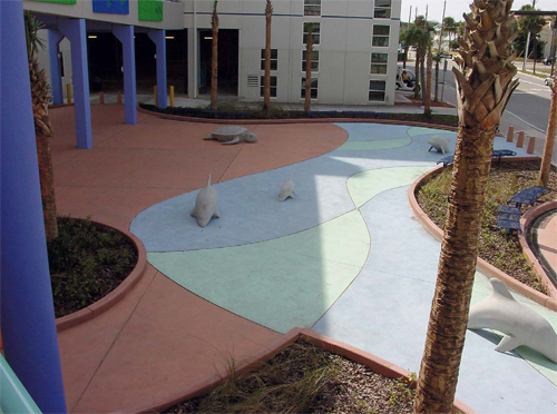 This walkway in Florida was created with integral color. The integral colors used are Cranberry, Marina Green and Powder Blue, which were originally produced by QC Construction Products. They are now manufactured by ChemSystems Inc. Photos courtesy of Chris Sullivan