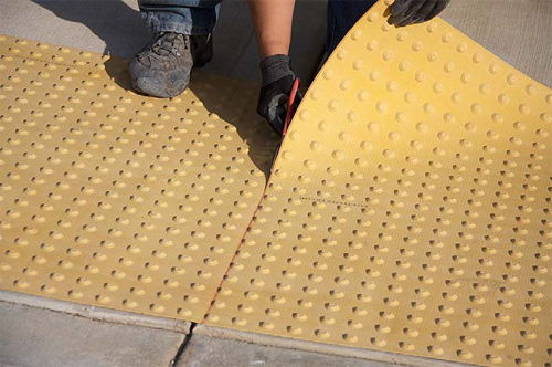 SafetyStepTD is a system of truncated domes on flexible mats that can be easily cut to any shape. 
