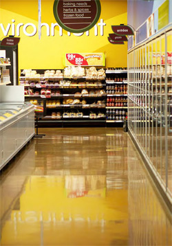 The sales floor is polished and stained, while the back areas are only treated with a sealer.
