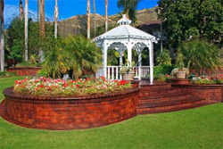The resort wanted do something unique with its concrete sidewalks and hardscapes, which were at the time a dull salmon color. The area serves as a gathering area for golfers and wedding parties, so the client wanted to create a richer look that blended more with the surrounding landscape. House and his crew used products from Concrete Solutions to create a gorgeous masterpiece.