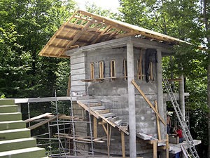 In process look at the building of the concrete treehouse.