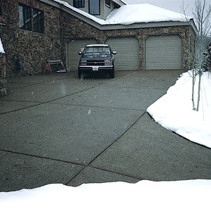 A snowmelting system can be manually controlled or set up with a sensor that will turn it on automatically when snow falls.
