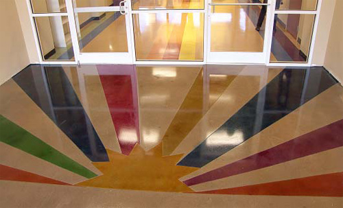Concrete dyes were used to create a sunrise affect on this concrete floor.