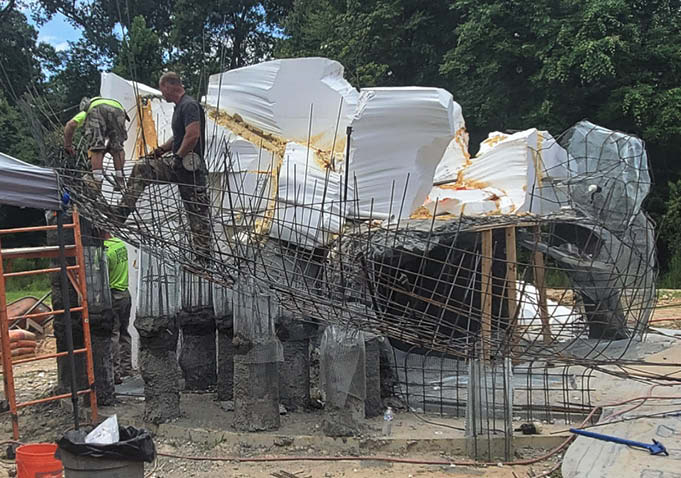 The armature built for the concrete rocks that would then be a water feature.