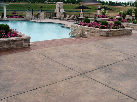 Stamped and stained concrete pool deck.