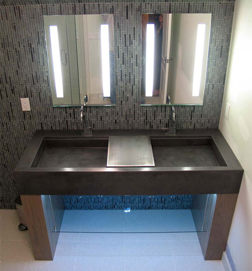 An inexpensive motion sensor can turn on an LED strip light under a sink to create night lighting in a bathroom.