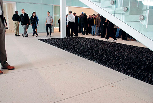 ground the floors down to expose aggregate and honed them using 200-grit resin diamond pads.