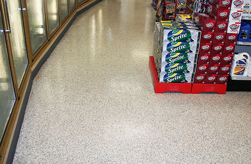 This floor features a double-broadcast quartz system. The client was looking for a decorative floor as well as a surface that was both impact- and slip-resistant.