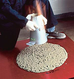 A concrete slump flow test showing the spreading characteristics of self-consolidating concrete.
