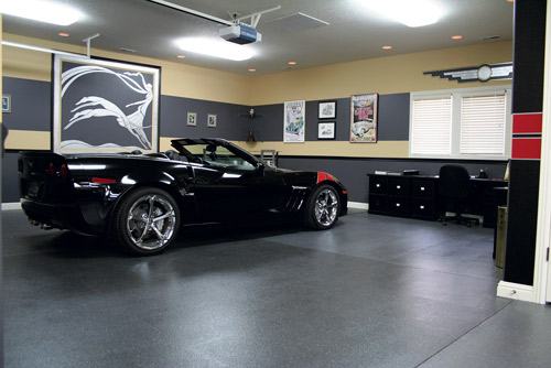 Knowing Fischer would be the best man to tackle their garage, which houses Eikenberrys black 2010 Corvette, the couple sat down with him for consultation sessions in 2010. Fischer helped them design a new layout for the large, horseshoe-shaped garage, designating spots for an office, bar, lounge area, car detailing area and car wash area.