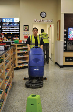 Mid Atlantic Floor Care employee Casey Elswick runs a Clarke Focus II autoscrubber at a Wawa convenience store in Midlothian, Va. Photo courtesy of Susan Wilkerson