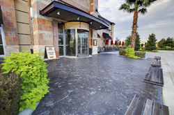 Entrance to a hotel with a dark black stain.