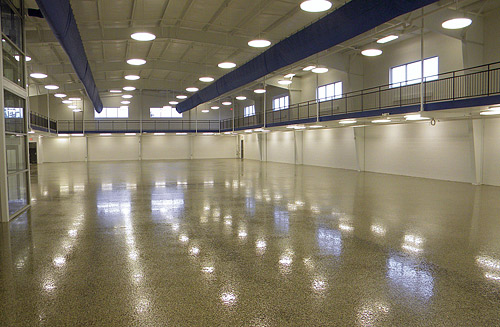 Fuller Industries Inc., of Nashville, Tenn., installed 18,000 square feet of Crawford Laboratories Inc.s Florock FloroChip mica flooring system at a secondhand book and CD store in Nashville, Tenn. The crew broadcast a custom blend of mica chips from Torginol Inc. into polymer components from Florock. Photo courtesy of Fuller Industries Inc.