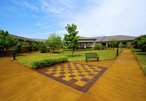 Volunteers from the ASCC Decorative Concrete Council traveled to Hanson, Ky. to work on the hardscape of what is to become a therapeutic garden at the Ballard Western Kentucky Veterans Center.