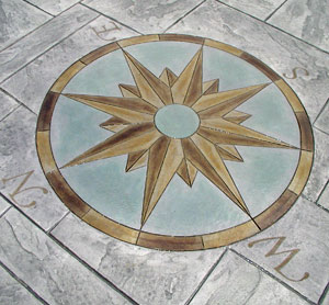 Decorative concrete stamped compass rose